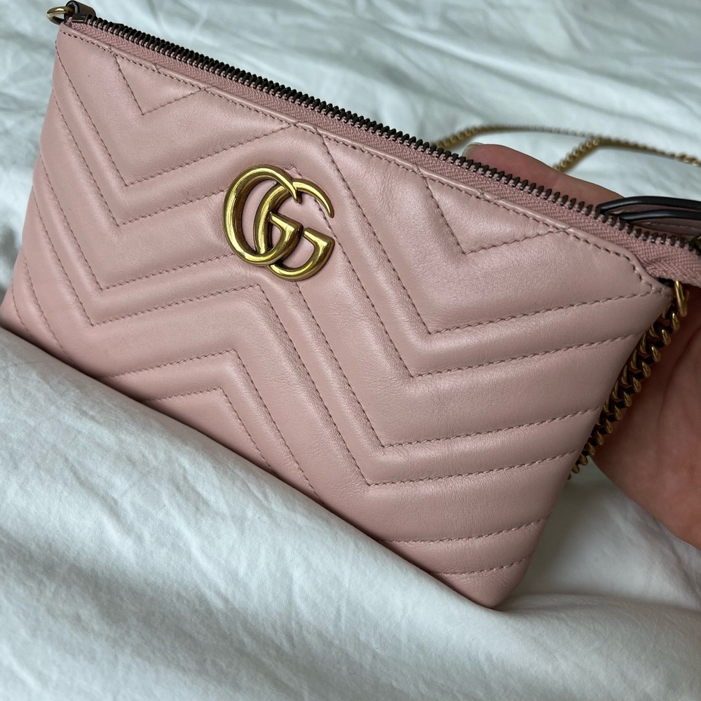 Pink Gucci bag with gold hardware